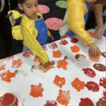 Student Creating Mural